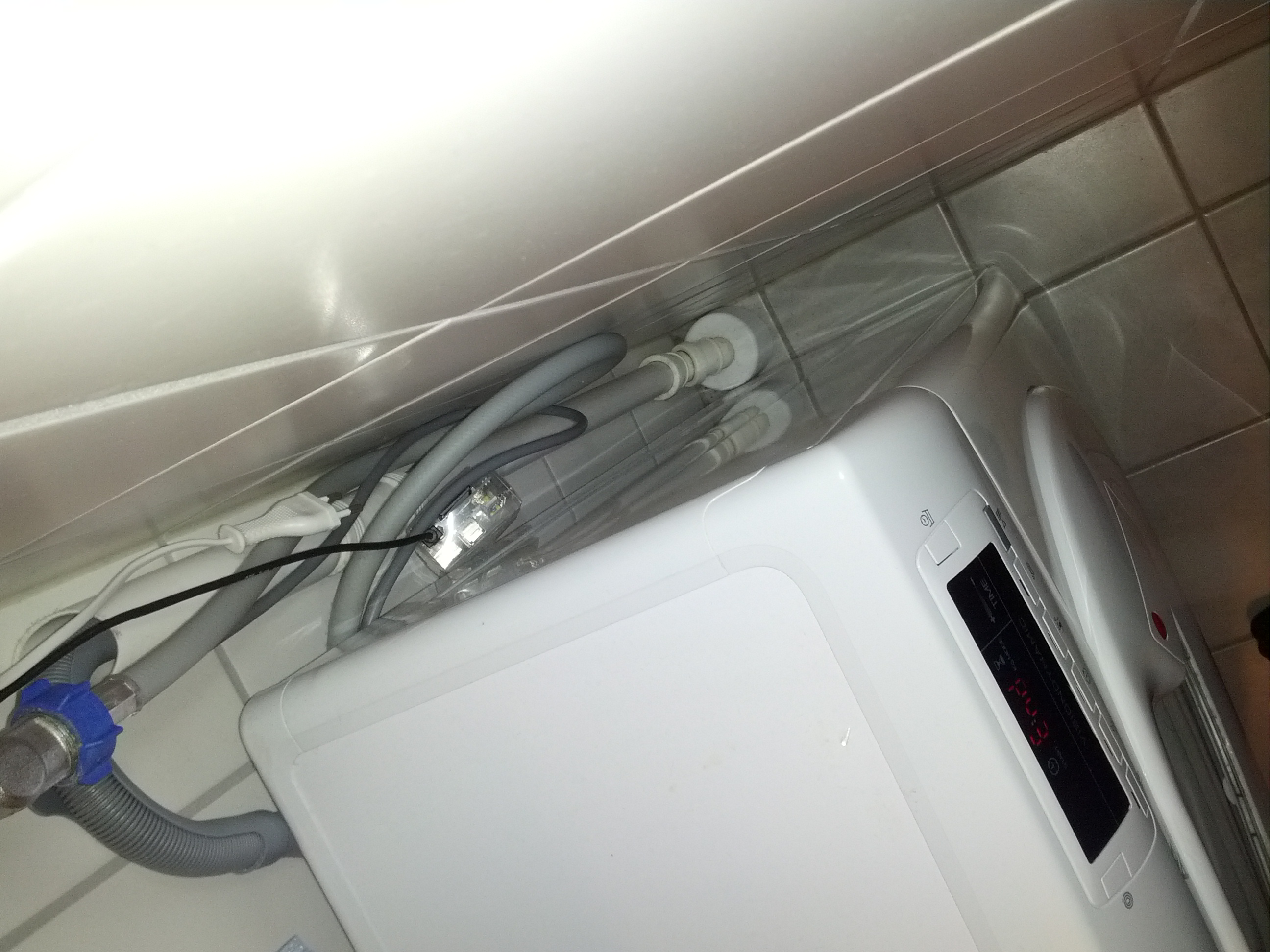 Pi placed beside washing machine.
